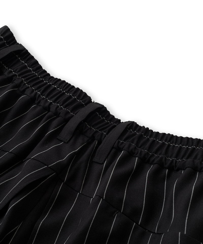 Inverted pleated half trousers